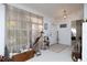 Foyer area with natural light, neutral color scheme and decorative accents at 2576 Shilo Glynn Ln, New Smyrna Beach, FL 32168