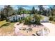 Charming exterior of a single-Gathering home with well-manicured landscaping, decorative rocks, and a paved walkway at 2576 Shilo Glynn Ln, New Smyrna Beach, FL 32168