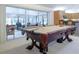 Entertaining game room featuring a pool table and seamless access to the outdoor lanai at 2576 Shilo Glynn Ln, New Smyrna Beach, FL 32168