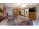 Comfortable main bedroom featuring a spacious layout, a ceiling fan, and an attached bathroom at 2576 Shilo Glynn Ln, New Smyrna Beach, FL 32168