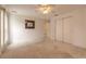 Bedroom with a ceiling fan, closet, and access to the rest of the home at 2626 Turnbull Estates Dr, New Smyrna Beach, FL 32168