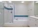 Bathroom with large bathtub, shower and vanity at 265 Minorca Beach Way # 505, New Smyrna Beach, FL 32169