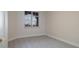 Bright bedroom features a large window with a view at 265 Minorca Beach Way # 505, New Smyrna Beach, FL 32169