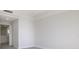 Bedroom features a large wall to wall window and light walls at 265 Minorca Beach Way # 505, New Smyrna Beach, FL 32169