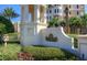 Elegant Minorca community entrance with lush landscaping and iconic signage at 265 Minorca Beach Way # 505, New Smyrna Beach, FL 32169