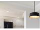 Stylish kitchen with stainless steel appliances and modern lighting at 265 Minorca Beach Way # 505, New Smyrna Beach, FL 32169