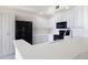 Modern kitchen features white cabinets, stainless steel appliances, and a bright countertop at 265 Minorca Beach Way # 505, New Smyrna Beach, FL 32169