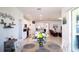 Open floor plan with views from the dining area through the kitchen and into the living room at 2820 Neverland Dr, New Smyrna Beach, FL 32168