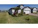 Charming home featuring a manicured lawn, vibrant landscaping and well-maintained exterior at 2820 Neverland Dr, New Smyrna Beach, FL 32168