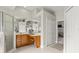 Bathroom featuring a glass shower, double vanity with abundant counter space, and a connecting walk-in closet at 29 Promenade At Lionspaw, Daytona Beach, FL 32124