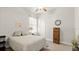Cozy bedroom with carpet, featuring a comfortable bed, dresser with storage, and ample natural light at 29 Promenade At Lionspaw, Daytona Beach, FL 32124