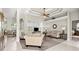 Spacious living room with coffered ceiling, neutral color palette, and open layout flowing into the dining area at 29 Promenade At Lionspaw, Daytona Beach, FL 32124