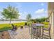 Backyard patio with a lake view and comfortable seating arrangement at 2943 Gibraltar Blvd, New Smyrna Beach, FL 32168