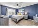 Comfortable bedroom with gray furniture and stylish decor at 2943 Gibraltar Blvd, New Smyrna Beach, FL 32168