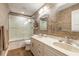 Modern bathroom featuring a double vanity, walk-in shower and stylish accents at 315 N Causeway # C402, New Smyrna Beach, FL 32169