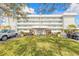 Waterway West condos with manicured lawns and landscaping, creating a welcoming entrance at 315 N Causeway # C402, New Smyrna Beach, FL 32169
