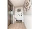 Hallway featuring a flamingo statue and a door adorned with a festive wreath at 315 N Causeway # C402, New Smyrna Beach, FL 32169