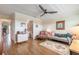 Charming living room showcasing a decorative fireplace, artwork, and an open layout at 315 N Causeway # C402, New Smyrna Beach, FL 32169