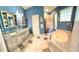Large bathroom showcasing the tub, a tiled shower, and a dual sink vanity with a granite countertop at 3435 Black Willow Trl, Deland, FL 32724