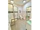 Modern bathroom with glass shower, unique vanity with basin sink, and textured walls at 3435 Black Willow Trl, Deland, FL 32724