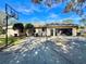 An inviting home featuring an attached garage, a well-maintained lawn, and a cozy neighborhood ambiance at 3435 Black Willow Trl, Deland, FL 32724