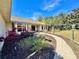 Charming home with a landscaped front yard, a curved walkway and well-maintained garden beds at 3435 Black Willow Trl, Deland, FL 32724