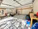 Spacious two-car garage with ample storage space and workspace at 3435 Black Willow Trl, Deland, FL 32724