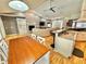 Open floor plan with a living room, fireplace, and hardwood floors at 3435 Black Willow Trl, Deland, FL 32724