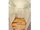 Spacious walk-in closet with hardwood floors and wire shelving for optimal storage and organization at 3435 Black Willow Trl, Deland, FL 32724