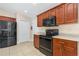 Modern kitchen featuring stainless steel appliances, plenty of cabinet space, and granite countertops at 3683 Jackson St, Port Orange, FL 32129