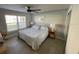 Comfortable bedroom with natural light, neutral decor, and ample closet space at 3801 S Atlantic Ave # Ut125, New Smyrna Beach, FL 32169
