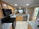 Bright kitchen with stainless steel appliances and ample counter space at 3801 S Atlantic Ave # Ut125, New Smyrna Beach, FL 32169