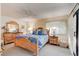 Bright bedroom with a ceiling fan, a wooden dresser, and a window at 4322 Sea Mist Dr # 4322, New Smyrna Beach, FL 32169