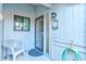 Welcoming covered porch with seating area, providing a relaxing outdoor space at 4322 Sea Mist Dr # 4322, New Smyrna Beach, FL 32169