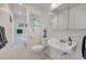 Bathroom with vintage style sink, toilet and tiled floor at 4624 Van Kleeck Dr, New Smyrna Beach, FL 32169