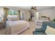 Bright bedroom with two beds, ceiling fan and plenty of storage space at 4624 Van Kleeck Dr, New Smyrna Beach, FL 32169