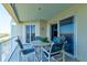 Spacious balcony perfect for entertaining, offering serene views and comfortable seating at 5 Riverwalk Dr # 506, New Smyrna Beach, FL 32169