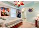 Bedroom featuring stylish furniture, ample natural light, and access to a closet at 5 Riverwalk Dr # 506, New Smyrna Beach, FL 32169