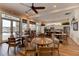 Bright dining area with multiple tables and chairs, with an adjacent bar area at 5 Riverwalk Dr # 506, New Smyrna Beach, FL 32169
