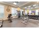 Well-equipped fitness center with weight machines, free weights, treadmills, and mirrored walls for a complete workout experience at 5 Riverwalk Dr # 506, New Smyrna Beach, FL 32169