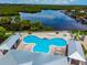 An aerial shot of the pool overlooking the river at 5 Riverwalk Dr # 506, New Smyrna Beach, FL 32169