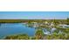 Breathtaking water view with palms, condos, mangroves, and docks at 5 Riverwalk Dr # 506, New Smyrna Beach, FL 32169