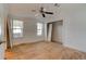 Bright bedroom featuring a ceiling fan and closet, ready for customization at 526 Powers Ave, Port Orange, FL 32127