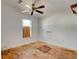 Bright, spacious bedroom with a ceiling fan and a window, ready to be personalized at 526 Powers Ave, Port Orange, FL 32127