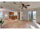 Bright open-concept interior featuring a kitchen with an island, and space for personalization and updates at 526 Powers Ave, Port Orange, FL 32127