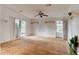 Inviting interior space with sliding glass doors and ample natural light, ready for your customization at 526 Powers Ave, Port Orange, FL 32127