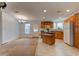 Bright and airy kitchen with an island, ample cabinet space, and room for dining and entertaining at 526 Powers Ave, Port Orange, FL 32127