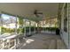 Relaxing screened porch with plenty of space for dining and entertaining guests at 526 Powers Ave, Port Orange, FL 32127