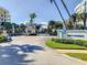 North entrance to the community with professional landscaping and clear signage for easy navigation at 5300 S Atlantic Ave # 7-307, New Smyrna Beach, FL 32169