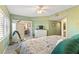 The main bedroom is bright and airy, offering balcony access and a view of the bathroom and closet at 5300 S Atlantic Ave # 7-307, New Smyrna Beach, FL 32169